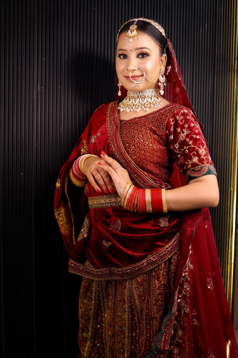 woman in a red and gold bridal outfit